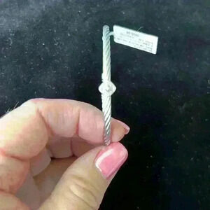 Alor 18k white gold with diamond.  SS grey cable